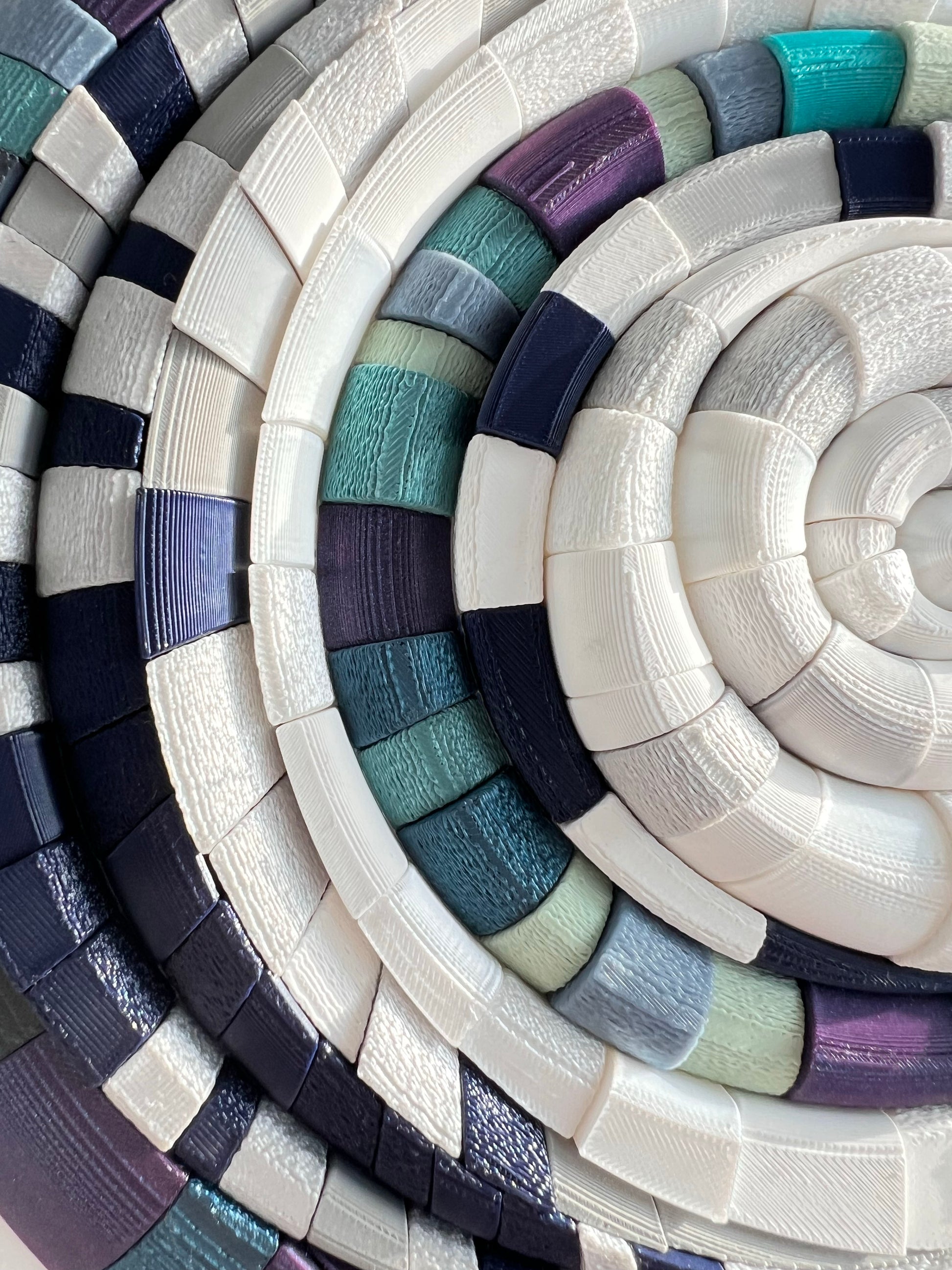 Close-up of Mosaic Moon Blue showing exclusive design with shimmering silver accents